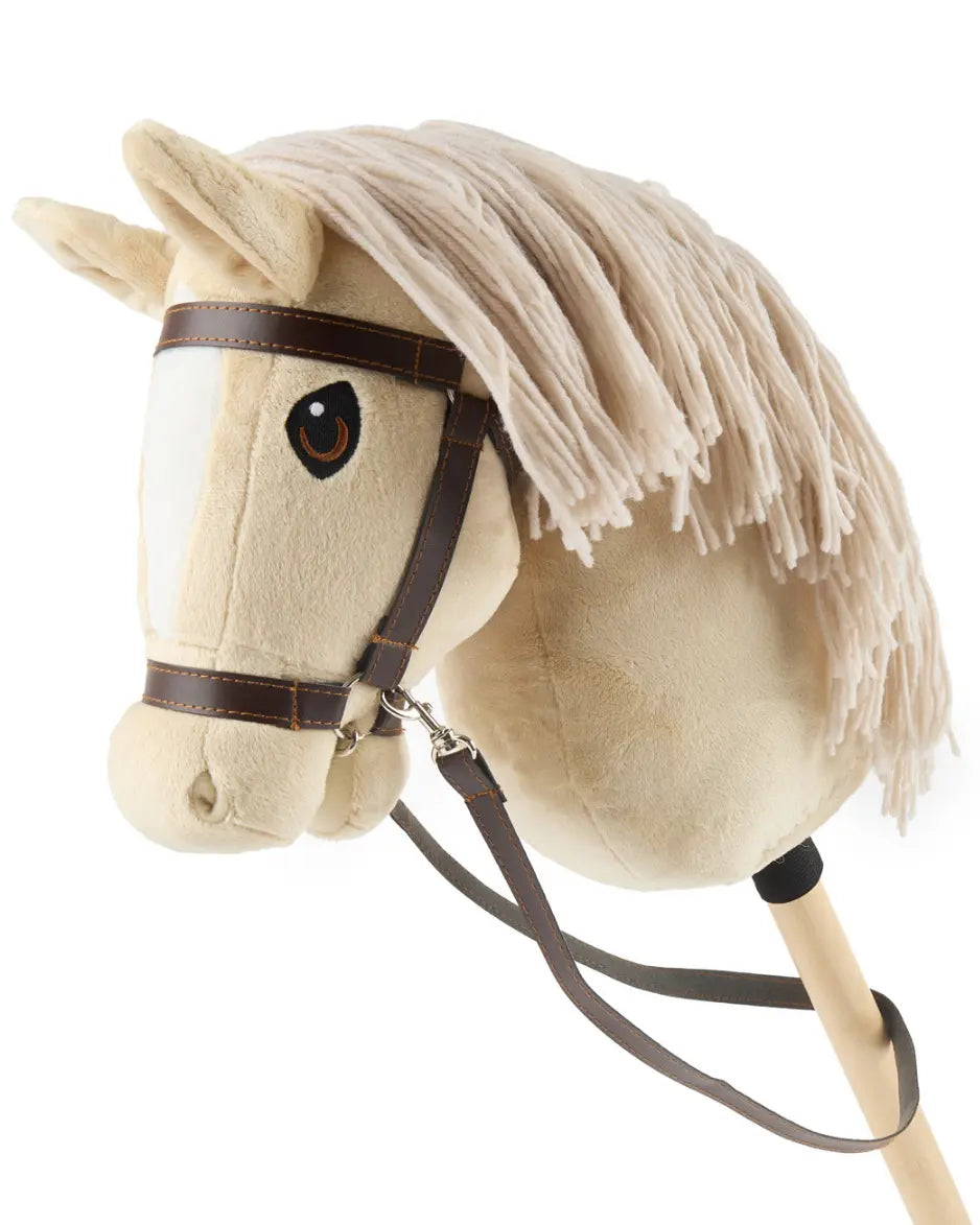 Seitenansicht eines Palomino Hbby Horses von Bieco inklusive brauner Trense mit Gebiss