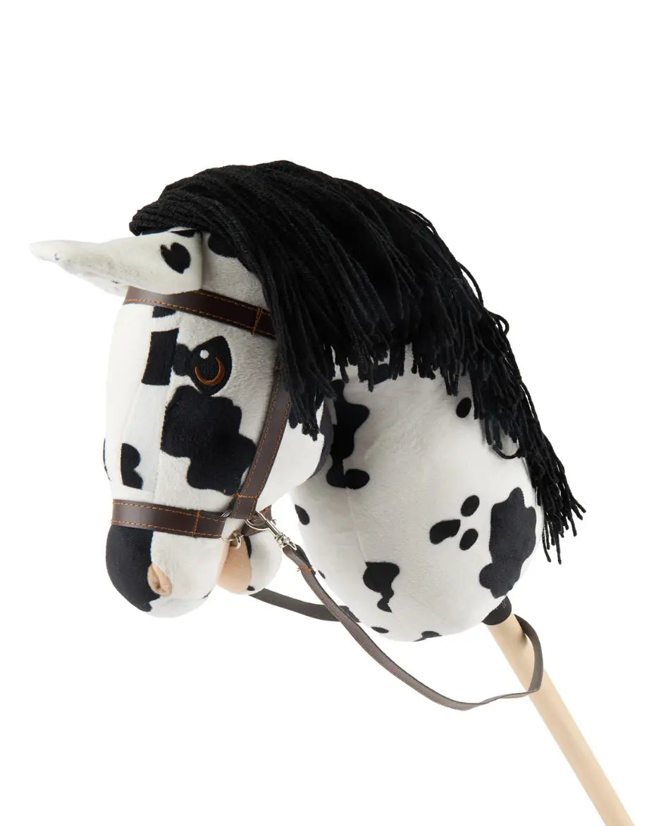 Hübscher Bieco Hobby Horse Schecke in schwarz und weiß mit einer Hobby Horse Trense