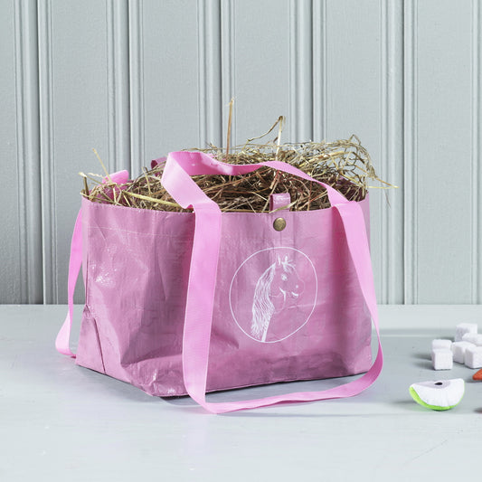 hobby horse tasche in rosa mit Abbildung eines hobby horses gefüllt mit heu
